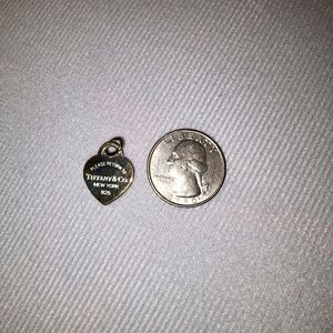 Tiffany's small pendant charm with box and pouch.